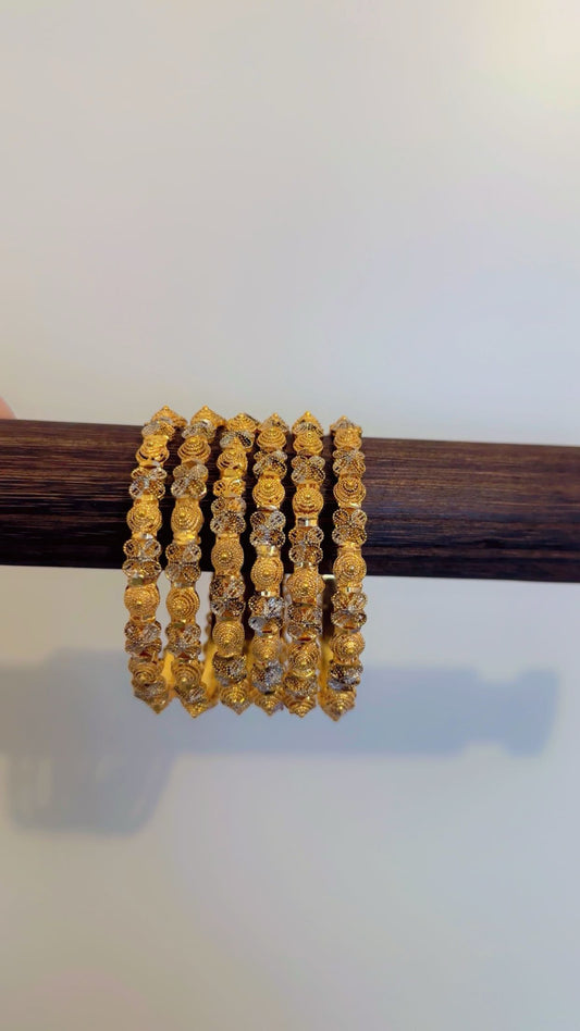 Gold plated bangles (2.4, 2.6)